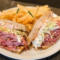 Pastrami Sandwich · Piled high sandwich served on your choice of bread or rolls with your choice of side. Hot sa...