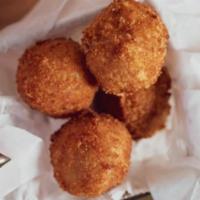 Reuben Fritters · Made in house and served with dipping sauce.