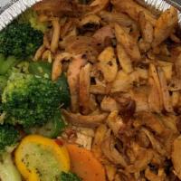 Chicken Shawarma Bowl · Tender thin sliced chicken marinated our house herbs and spices fire grilled on a vertical r...