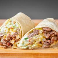 California Burrito · Flour tortilla with carne asada, french fries. Served with guacamole, onion, cilantro and to...