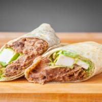 Milanesa Burrito · Flour tortilla with thinly sliced breaded beef. Served with lettuce, guacamole, onion, cilan...