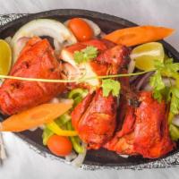 Chicken Tandoori · Grilled chicken marinated in yogurt and spices