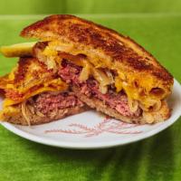 Patty Melt · House-ground beef burger with swiss cheese, caramelized onions served on toasted rye.