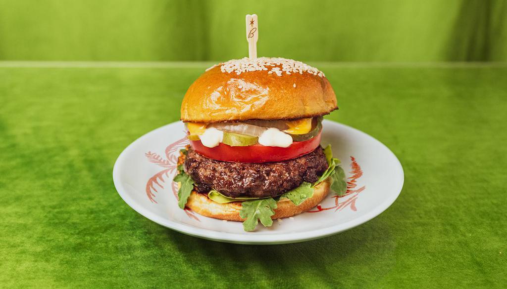 House Burger · Our special house burger with tomato, lettuce, onions, pickles, and house sauce.