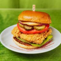 Fried Chicken Sandwich · Crispy chicken breast with tomato, lettuce, onion, pickles, and mayo.