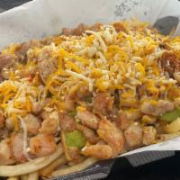 * Grilled Chicken Fries · Grilled chicken, cheese, guacamole and sour cream