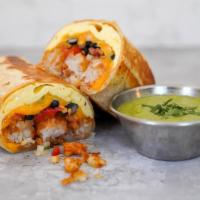 Huevos Rancheros Burrito · 3 fresh cracked cage-free scrambled eggs, melted Cheddar cheese, pico de gallo, roasted red ...