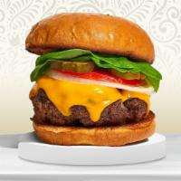 Cheese Me, Please Me Burger · American beef patty topped with melted cheese, lettuce, tomato, onion, and pickles. Served o...