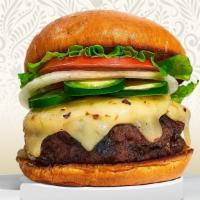 Jalapeño Abduction Burger · American beef patty topped with melted american cheese, jalapenos, lettuce, tomato, onion, a...