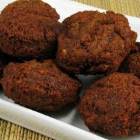 Falafel (6 Pieces) · Chickpeas ground with parsley, onions, garlic and spices shaped into balls and deep fried to...
