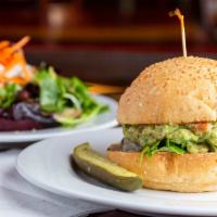 Spicy Guacamole Cheeseburger · Topped with homemade spicy guacamole, marinated jalapeños , fresh jaleoeno mayo and Pepper J...