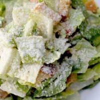 Caesar Salad · Romaine lettuce, croutons, shaved parmesan cheese and Caesar dressing.