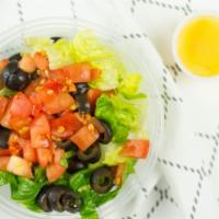 Greek Salad · Romaine lettuce, feta cheese, cucumber, kalamata olives onions and balsamic vinaigrette.