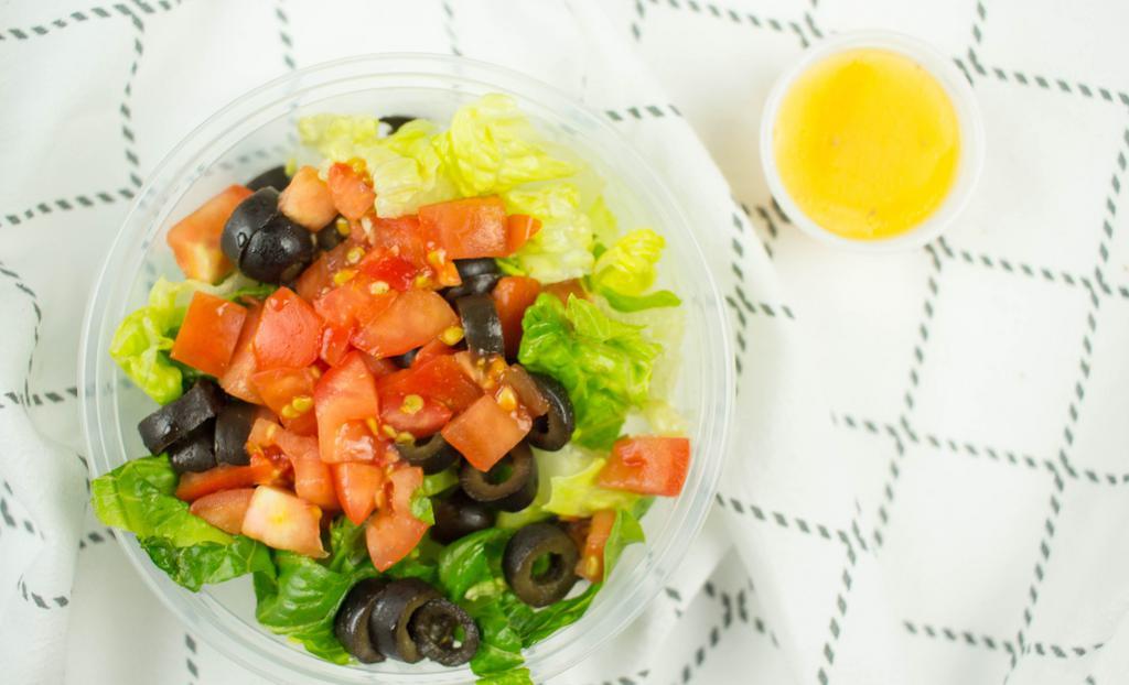 Greek Salad · Romaine lettuce, feta cheese, cucumber, kalamata olives onions and balsamic vinaigrette.