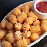 Tater Tots · Cooked in beef tallow. 
Can be made vegetarian.