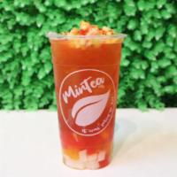 Tropical Iced Tea · Pineapple peach strawberry green tea with rainbow jelly topped with kiwi, strawberry, peach,...