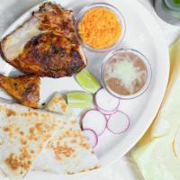 2 Pc Chicken + Quesadilla  · 2 pieces of our grilled chicken and a cheese quesadilla, served with 2 sides of your choice,...