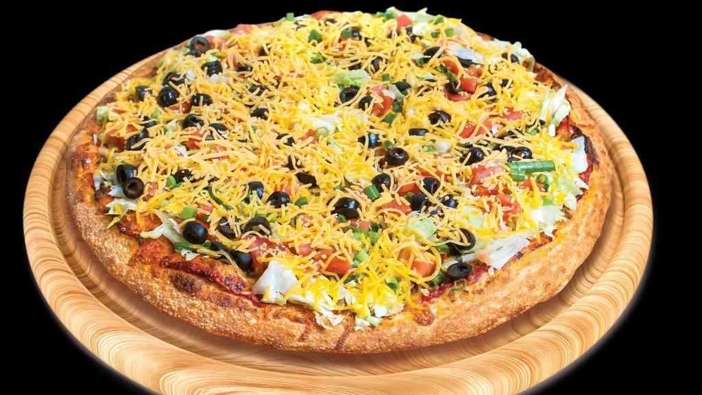 Taco Pizza (Large) · Taco sauce, mozzarella cheese, taco beef, fresh chopped lettuce, green onions, black olives, fresh chopped tomatoes, Cheddar cheese.