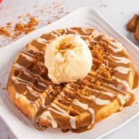 Lotus Waffle · Waffle topped with Lotus spread, drizzled with white chocolate and garnished with Lotus cook...