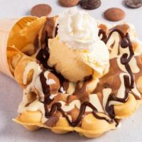 Chocolate Bubble Waffle · Bubble waffle served with vanilla ice cream and your choice of chocolate. Topped with whippe...