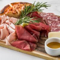 Tagliere Italiano · selection of imported &  domestic cheeses and charcuterie, grilled focaccia, fresh jam, truf...
