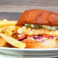 Grilled Fish Sandwich & Fries · Grilled wild pacific cod, coleslaw, pickles and tartar sauce.