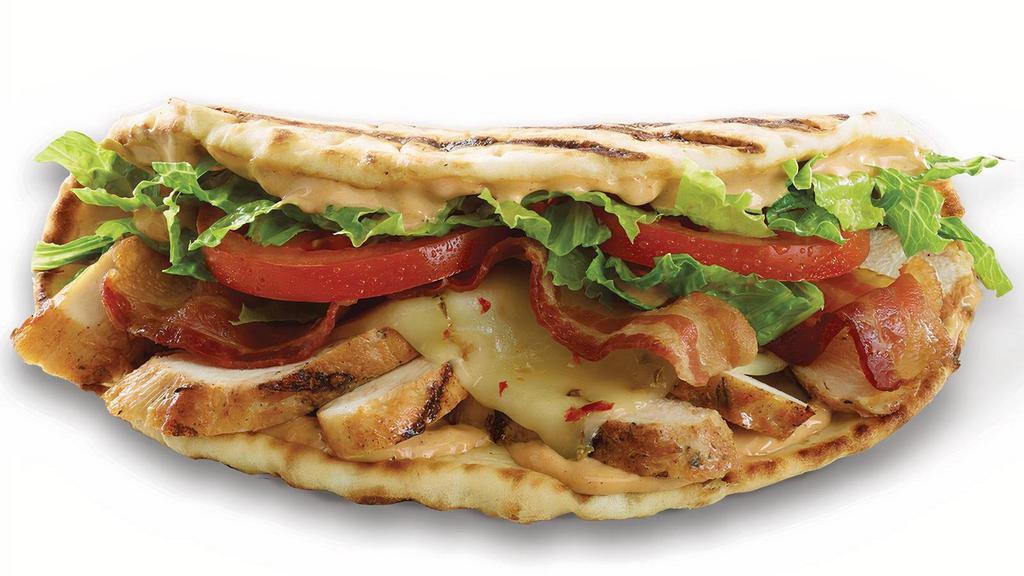 Chipotle Chicken Club · grilled chicken, bacon, tomatoes, romaine, pepper jack & chipotle mayo