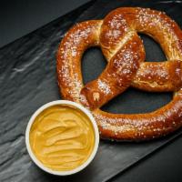 Pretzel · Soft baked Bavarian pretzel with salt and butter or plain.