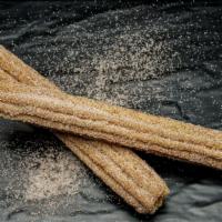 Churro · 16 inch warm churro dusted w/sugar and cinnamon.