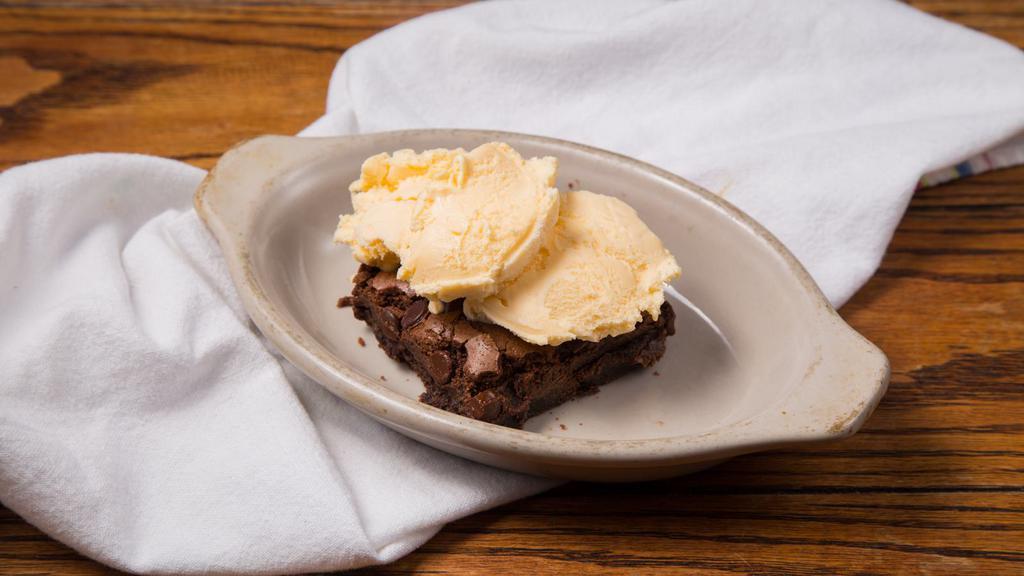 Large Chocolate Chip Brownie With Ice Cream · Large chocolate chip brownie with French vanilla ice cream.