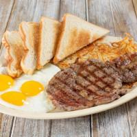 Steak & Eggs · 8 oz. Steak, 3 eggs, hash browns and toast.