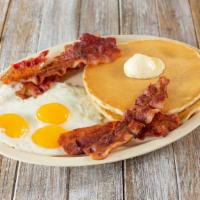 Pancake Combo  · 2 Pancakes, 3 eggs, and your choice of meat. Bacon or Sausage.