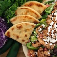 Greek Chicken Salad · Feta cheese, bell pepper, kalamata olives, pita bread, and greek style marinated chicken.