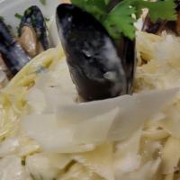 Seafood Pasta · Linguine, shrimp, scallops, mussels, clams, Parmesan cheese, mushroom, onions, fresh basil, ...