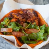 Shrimp Taco · Served on two corn tortillas with lettuce, , tomato, cilantro, Sky's sassy sauce