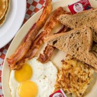 Fabulous Giant Breakfast · 2 eggs, 2 pancakes, hashbrown, toast, 3 bacon OR 3  sausages