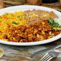 Chorizo & Eggs Breakfast · Pork chorizo scrambled with eggs and side of rice and beans, choice of corn or flour tortillas