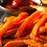 Sweet Potato Fries · The highest quality sweet potato fries served with your choice of dipping sauces.