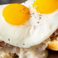 Country Breakfast · Fresh hot biscuit, sausage patties, and country gravy topped with two eggs.