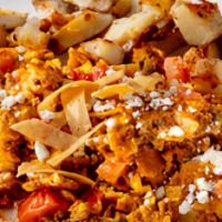 Southwest Chorizo Scramble · Three eggs scrambled with chorizo sausage, diced tomatoes, green onions, feta cheese, and cr...