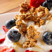 Granola Bowl · Nonfat greek yogurt, seasonal fruit, and organic granola.