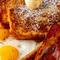 French Toast Combo · Our brioche French Toast, two eggs, bacon, and sausage.