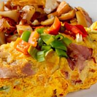 Denver Omelette · A western mix of shaved ham, green onions, red and green bell peppers.  Served with your cho...