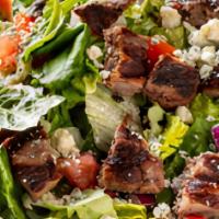 Bleu Cheese Steak Salad · Strips of CERTIFIED ANGUS BEEF steak, bleu cheese crumbles, diced tomato, and red onion on a...