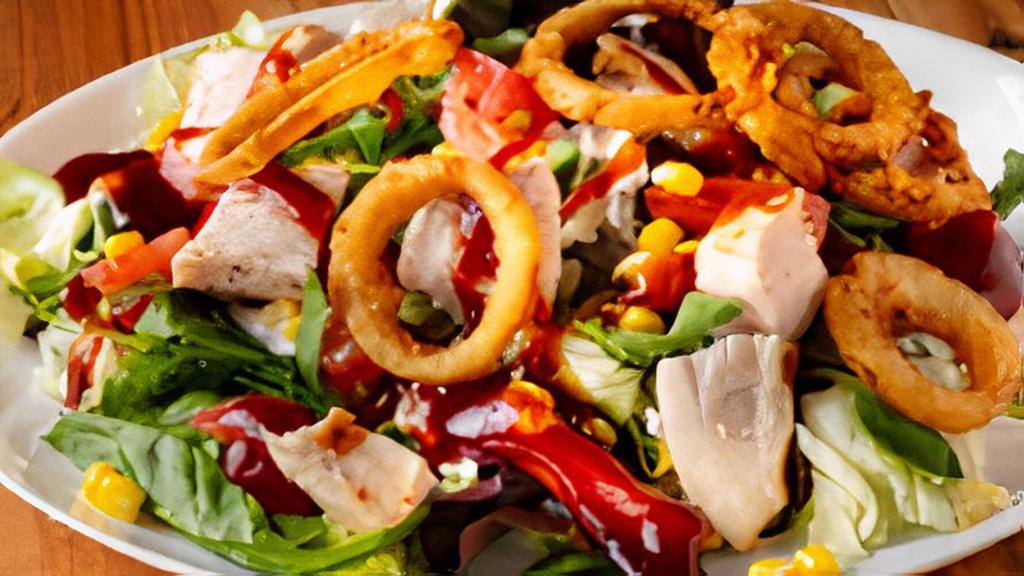 Bbq Chicken & Tangler Salad · Mixed greens and corn tossed in ranch dressing, with BBQ chicken breast, tomatoes, and crispy tangler onions.