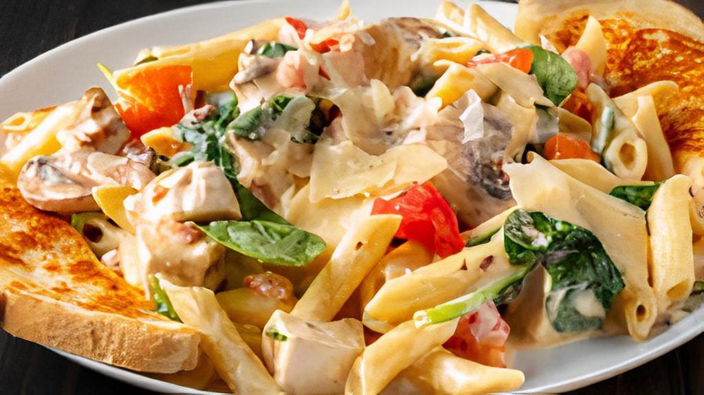 Chicken Alfredo · Penne pasta and grilled chicken breast tossed with fresh mushrooms, spinach, and diced tomatoes in our alfredo sauce. No veggies.