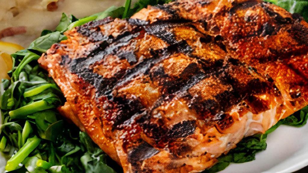 Wild Grilled Alaskan Salmon · Slightly spicy seasoning served on a bed of sauteed spinach with your choice of side. (Served best with mashed potatoes)