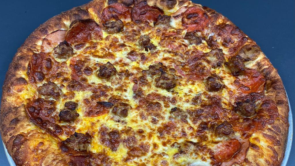 Morning Stampede (All Meat) · Canadian bacon, pepperoni salami, sausage,egg, cheddar, and mozzarella on our specialty dough and house blend spices. No sauce.