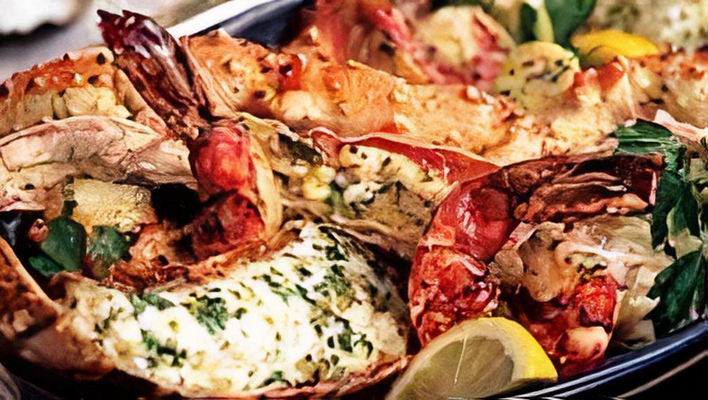 Lobster Plate · Lobster made with butter and lemon. Served with vegetables and rice.