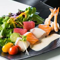 Sashimi Salad · 10pc Tuna, salmon, albacore yellowtail and shrimp. House Sesame Dressing and Ponzu on the Side